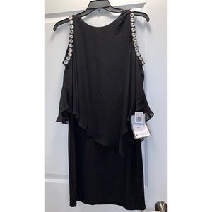 Black cocktail dress with rhinestone detail on sleeves